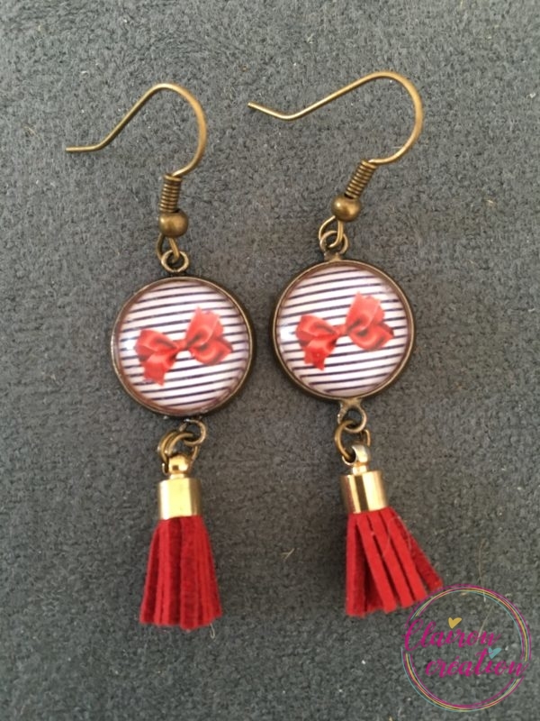 Boucles pompon nœud rouge