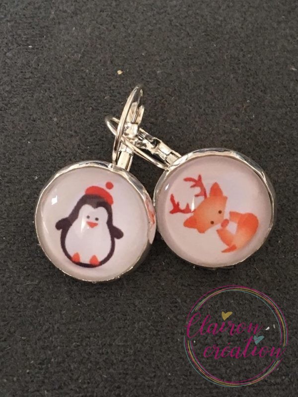 Boucles Noël bébé Cerf vs Bébé Pingouin