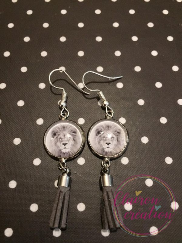 Boucles pompon Lion noir et blanc