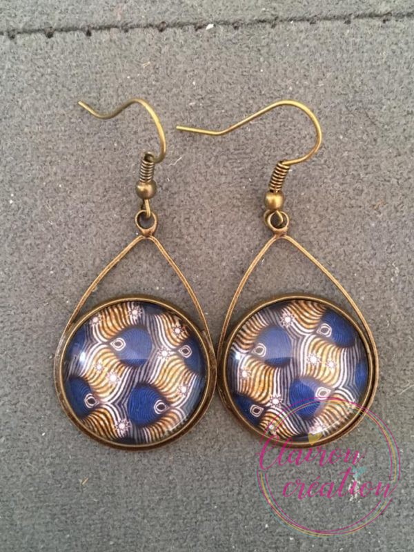 Boucles triangle plumes de paon