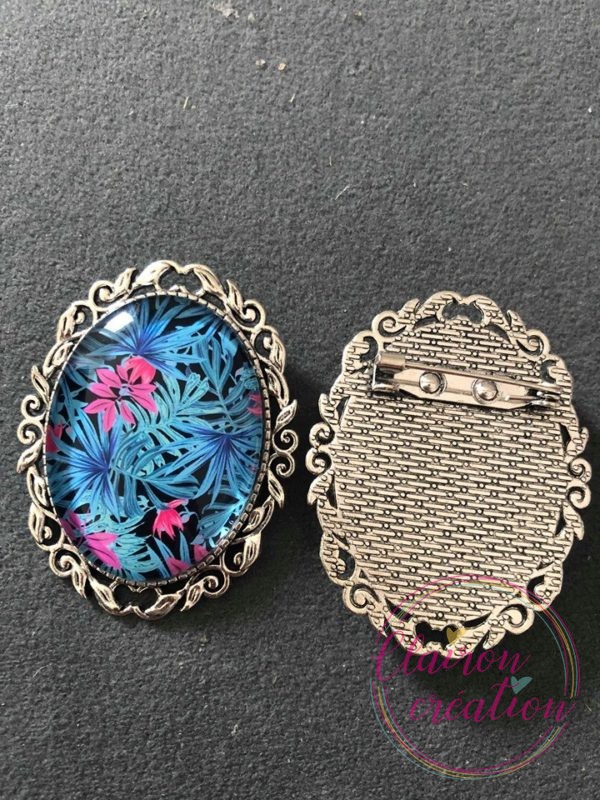 Broche feuillage tropical rose bleu