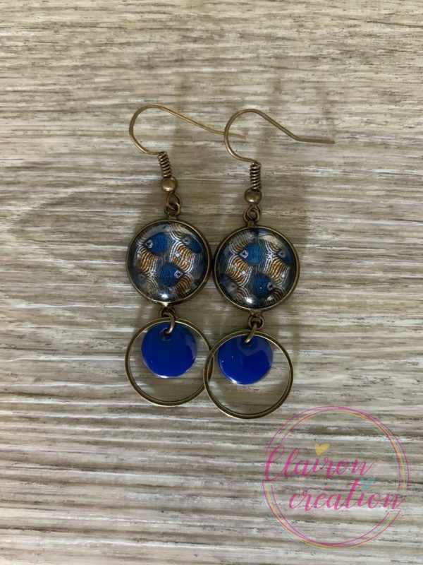 Boucles pendantes Plumes de Paons