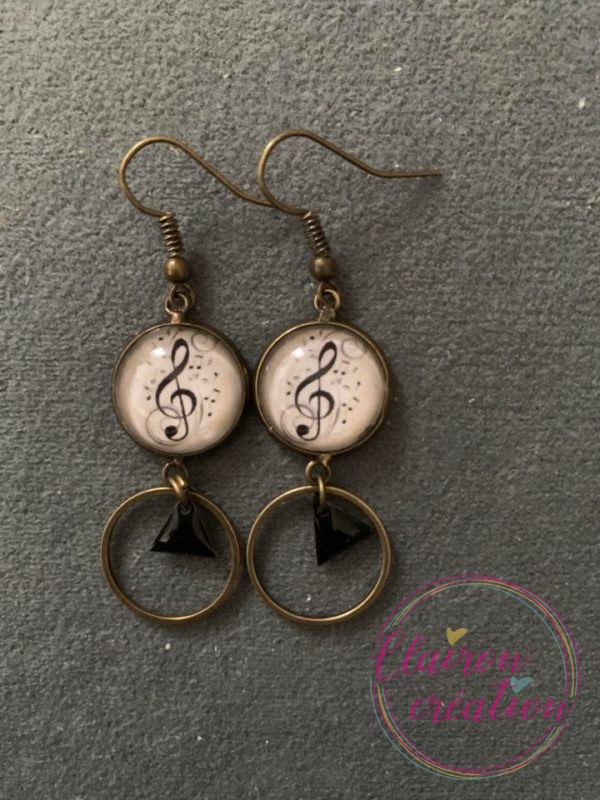 Boucles pendantes Note de Musique